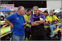 John Mazzoranno talks over the teams strategy for the upcoming rounds with Richard Dixon